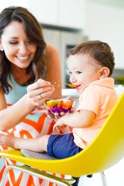 Ahimsa's infant products come with a patent-pending spoon that hooks onto the bowl.