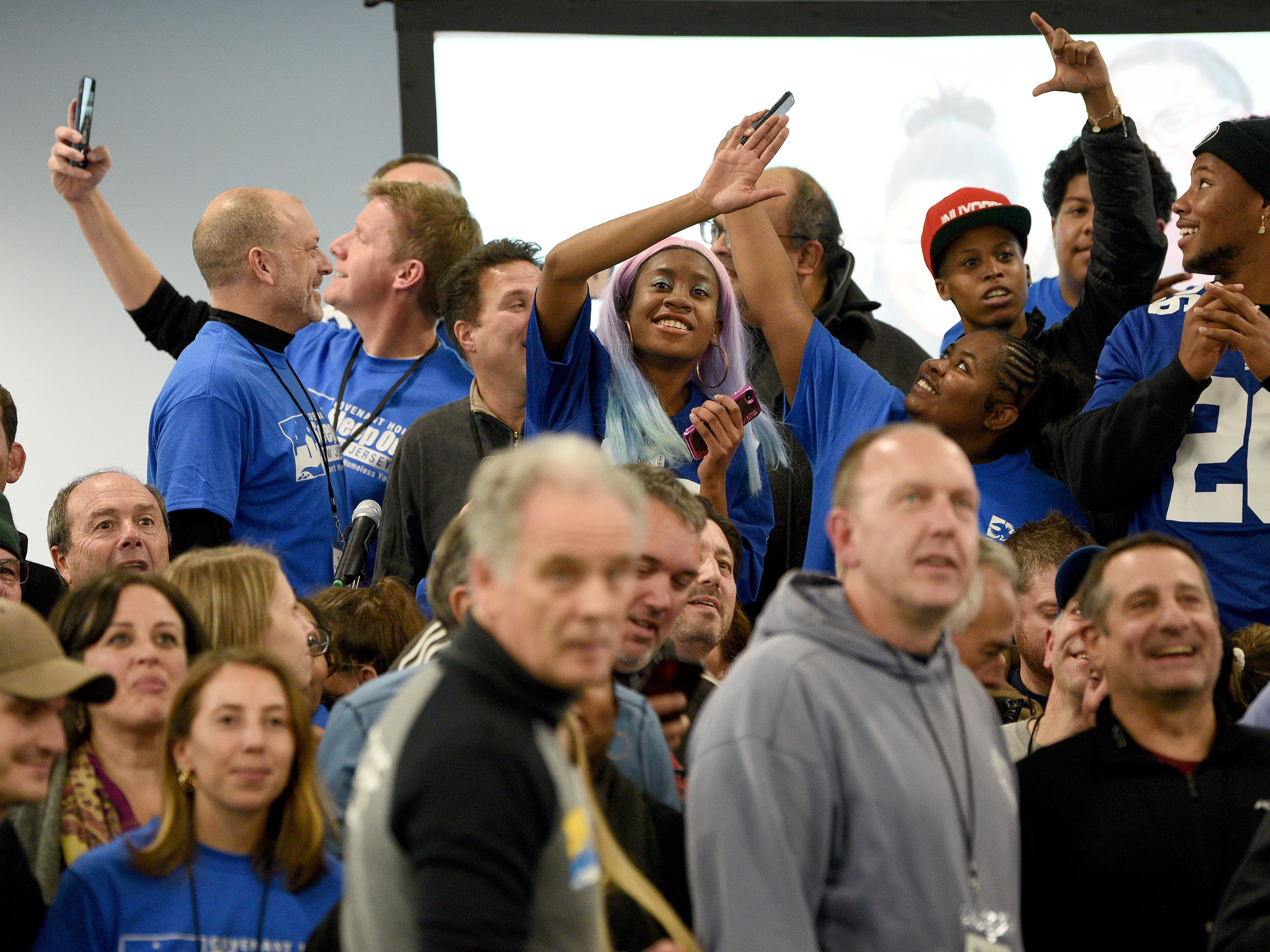 Covenant House holds a Sleep Out Executive Edition in Newark on Thursday November 21, 2019. Covenant House kids and fundraisers prepare to take a photo with Saquon Barkley a player with the Giants and Sleep Out: Executive Edition Chairman.