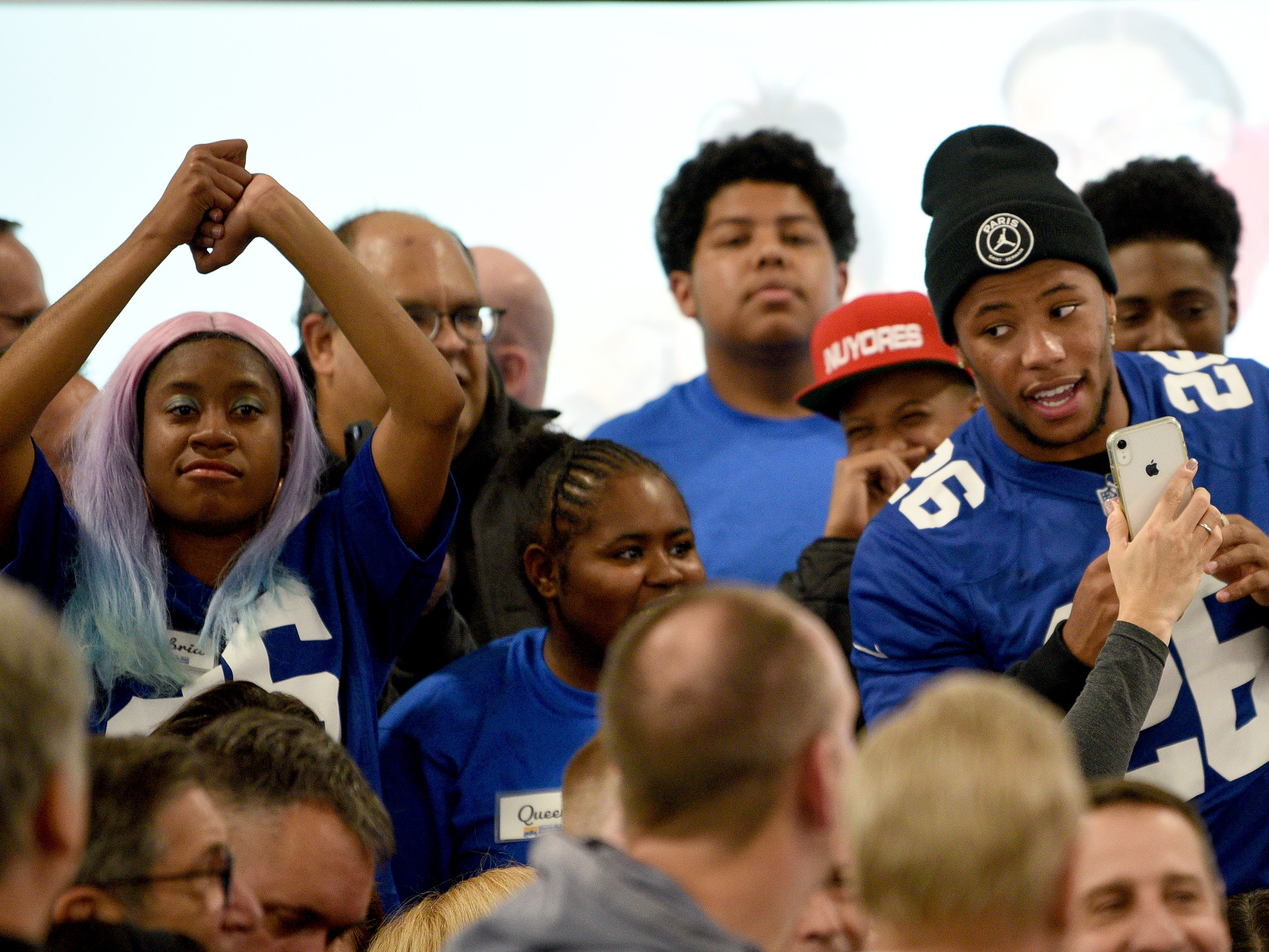 Covenant House holds a Sleep Out Executive Edition in Newark on Thursday November 21, 2019. Covenant House kids and fundraisers prepare to take a photo with Saquon Barkley a player with the Giants and Sleep Out: Executive Edition Chairman.