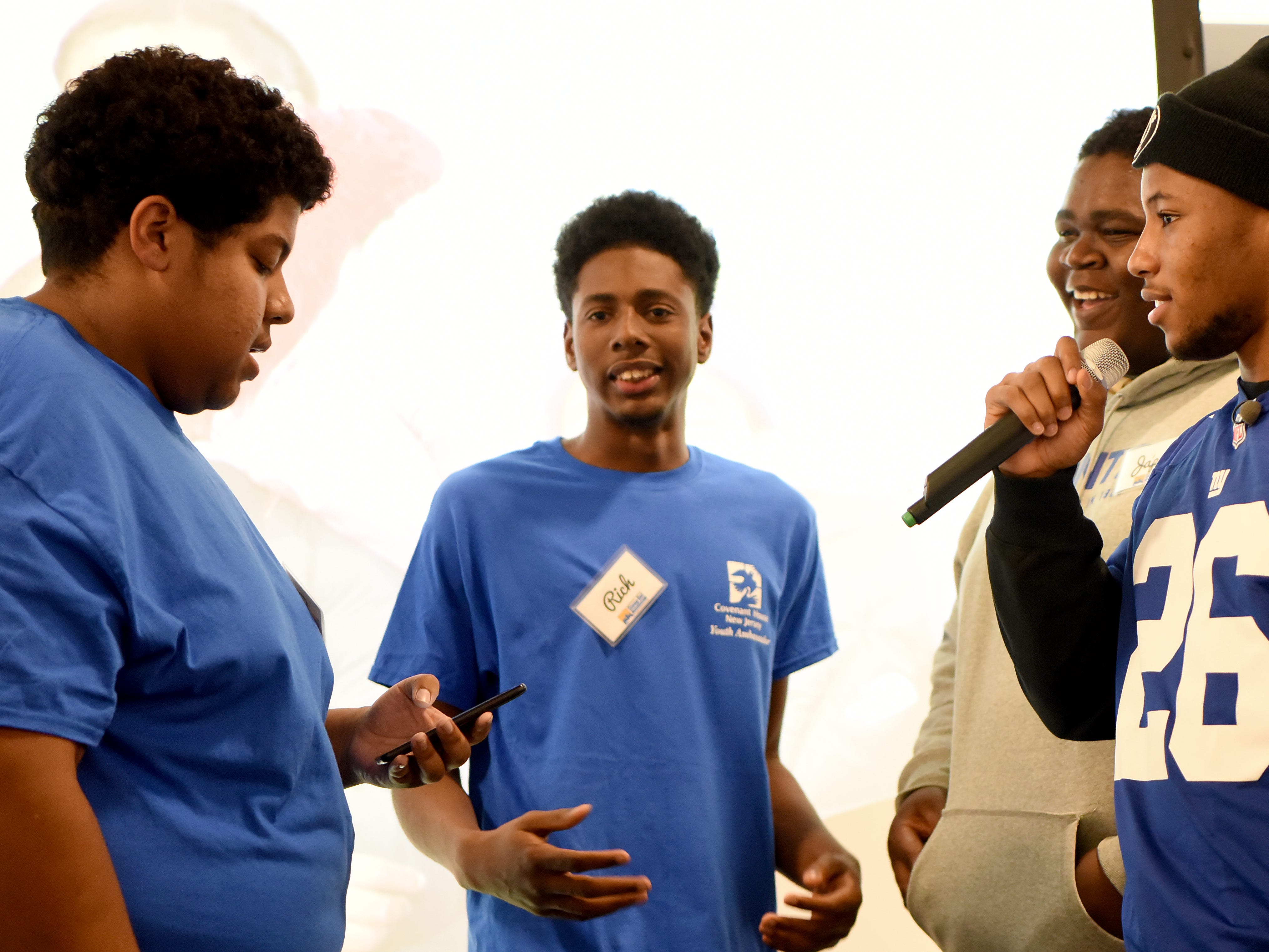 Covenant House holds a Sleep Out Executive Edition in Newark on Thursday November 21, 2019. Saquon Barkley from the Giants and Sleep Out: Executive Edition Chairman speaks to some of the Covenant House kids. 