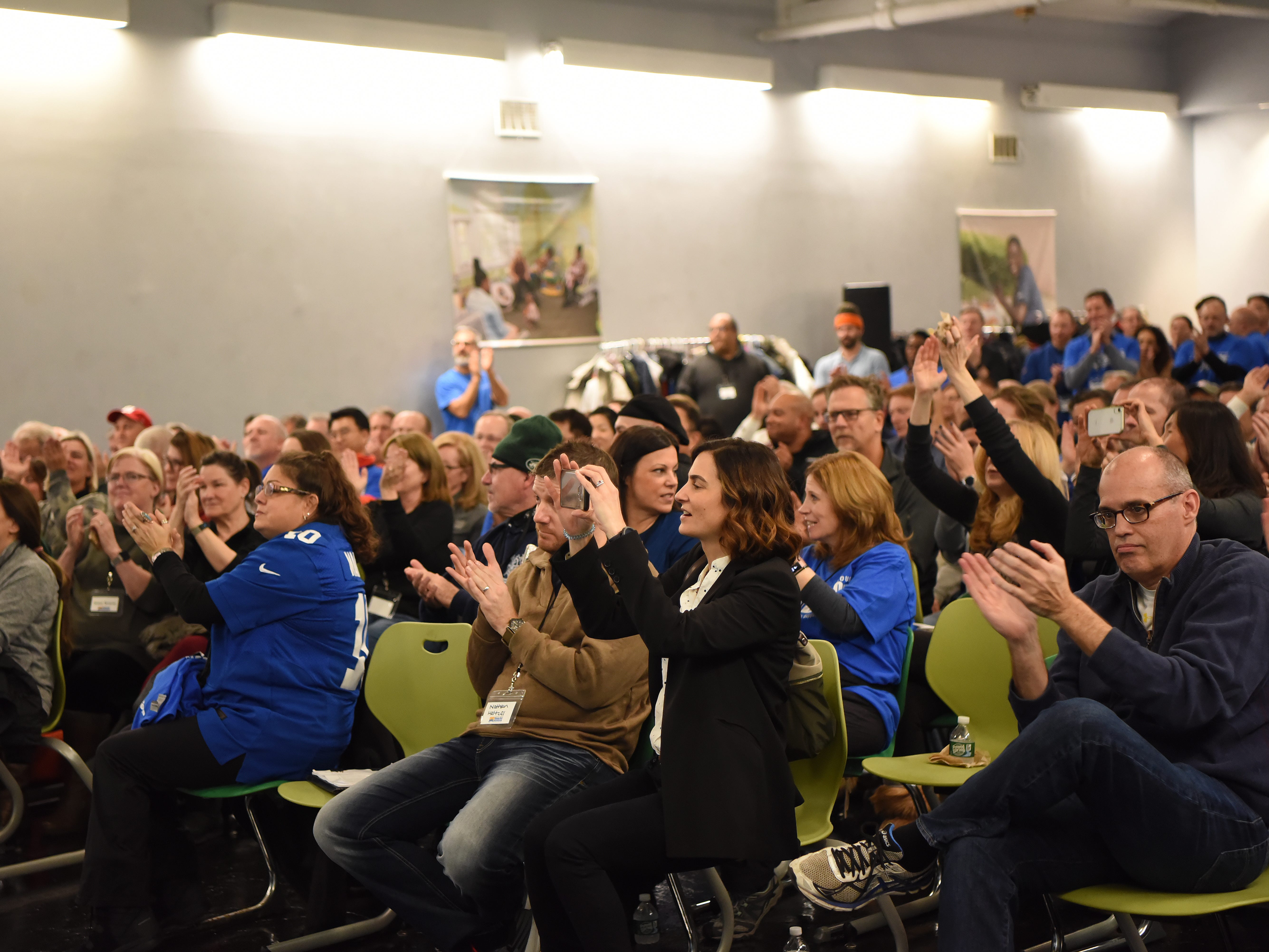 Covenant House holds a Sleep Out Executive Edition in Newark on Thursday November 21, 2019. Attendees cheer after hearing Covenant House raised over $900,000. 