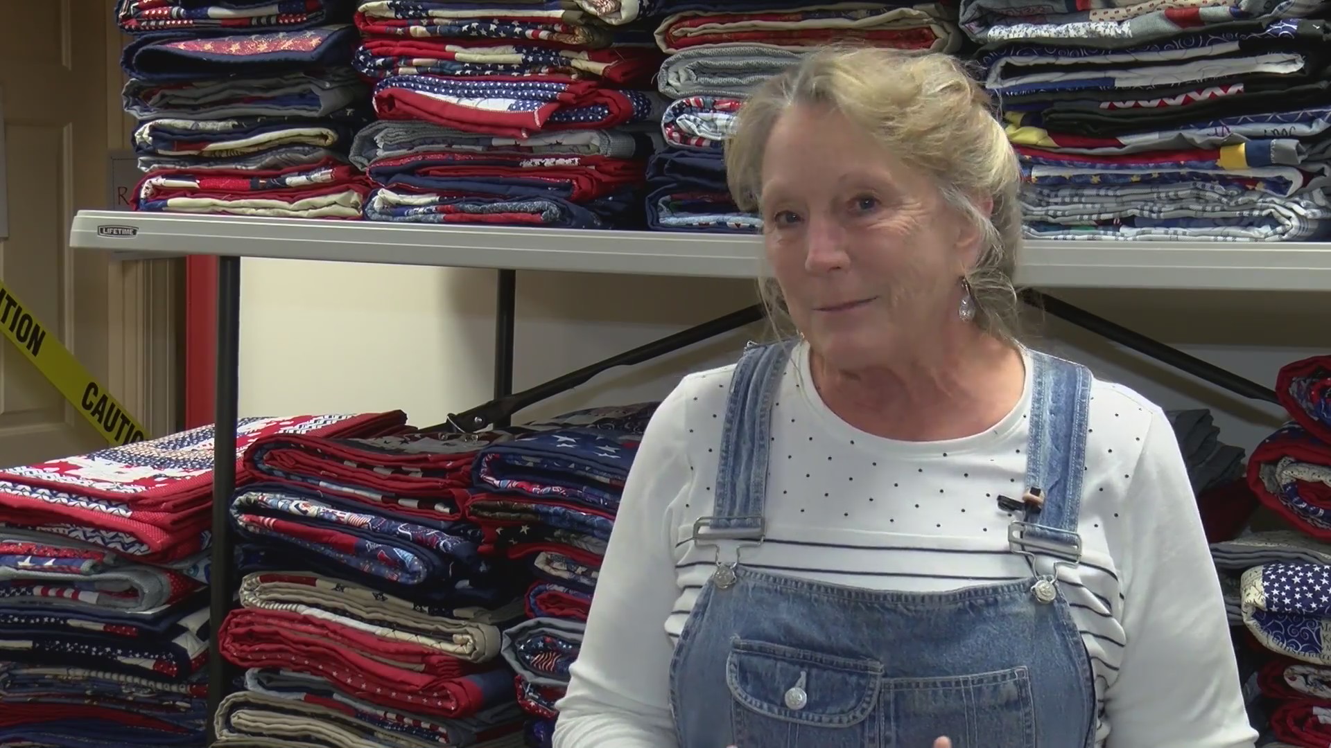 Thumbnail for the video titled "2,000th quilt stitched for injured U.S. troops"
