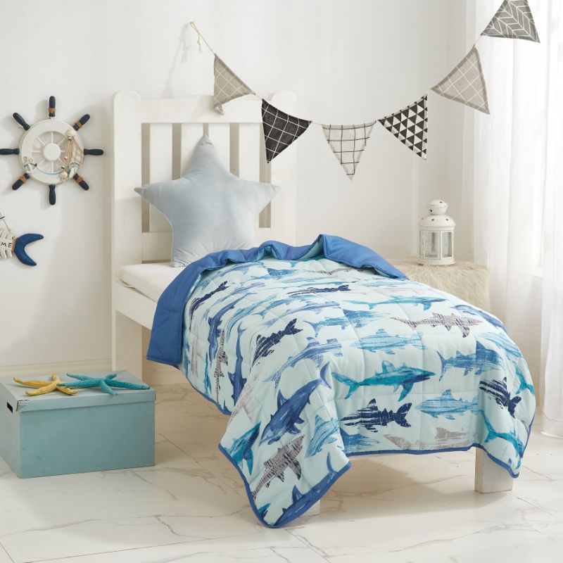 Take a bite out of sleep issues with this shark-themed blanket. (Photo: Walmart)
