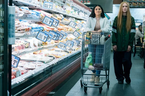 Gina Rodriguez, left, and Evan Rachel Wood in a scene from "Kajillionaire."