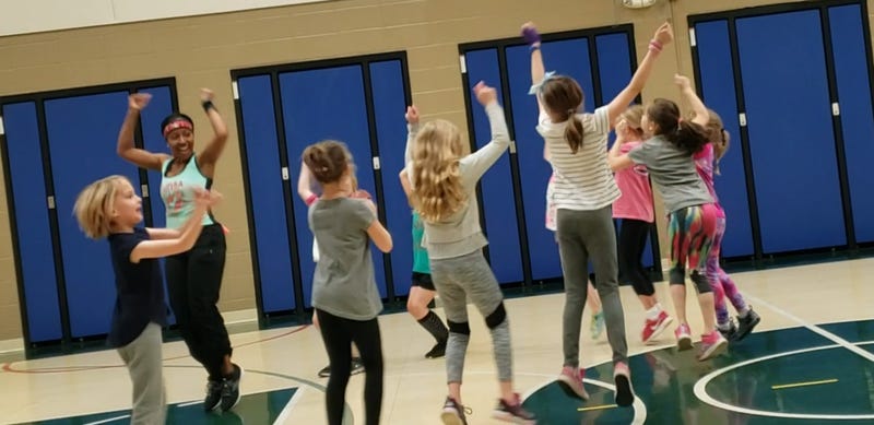 Naperville personal trainer Jepharya Badie teaches a youth class